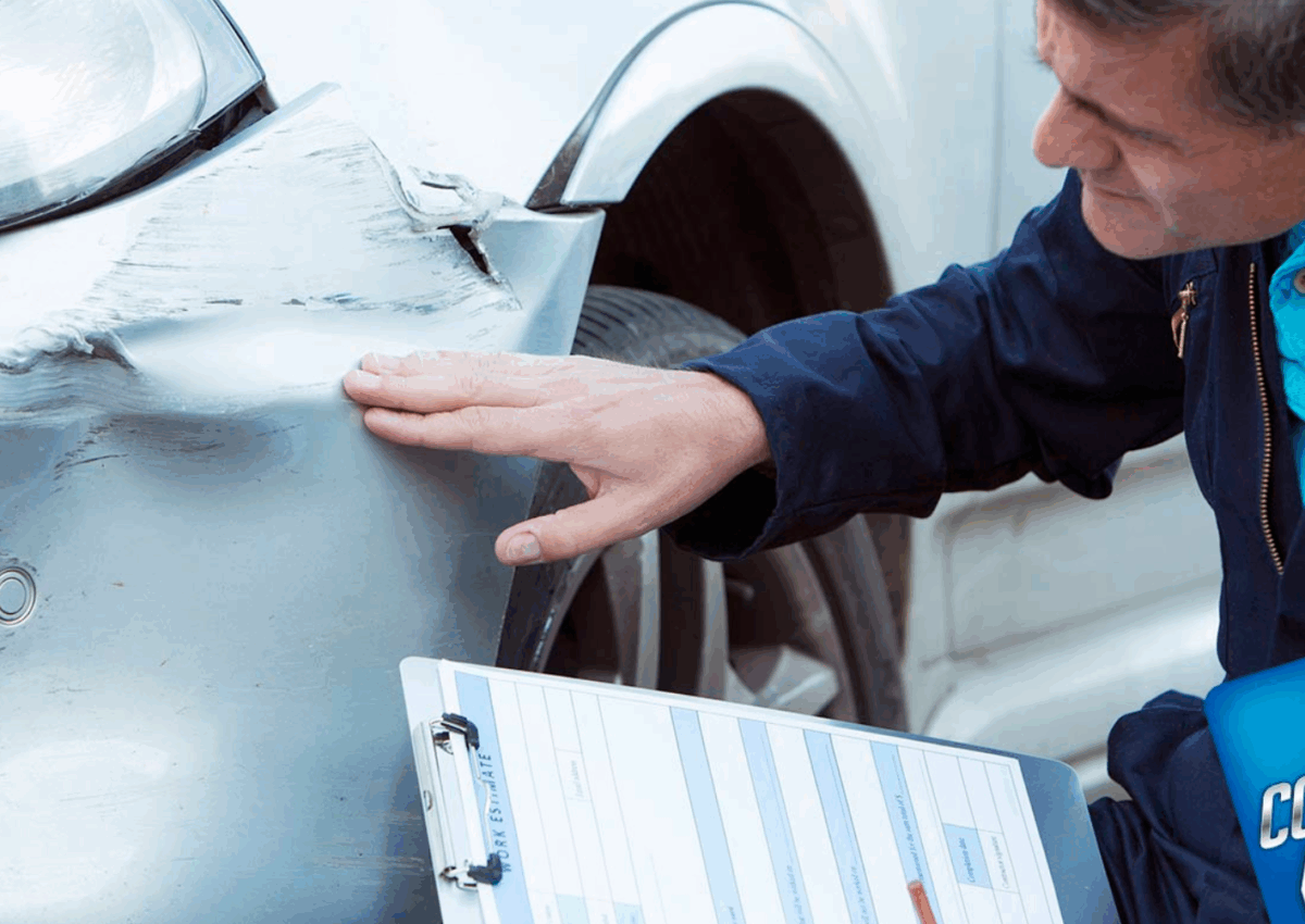 Professional Car Dent Repairs Birkdale technician repairing vehicle dents